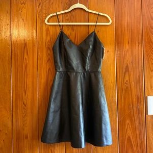 Short leather dress. New with tag! Size medium.
